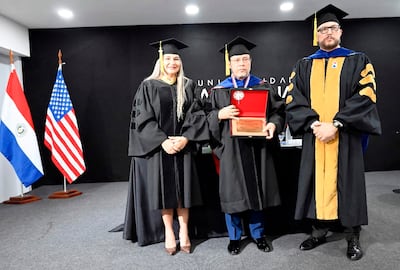 Directivos de la Universidad Americana hicieron entrega oficial del Doctorado Honoris Causa a Luis Noguerol.