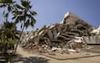 Fotografía que muestra escombros de edificios destruidos por los terremotos del 24 junio.