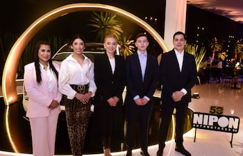 Los anfitriones de la recepción.