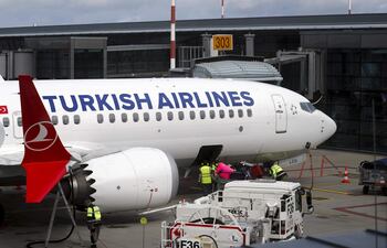 Riga (Latvia), 03/07/2024.- Turkish Airlines Boeing 737 MAX8 is seen at Riga Airport in Riga, Latvia, 03 July 2024. Riga Airport serves as a key Northern European air traffic hub, facilitating connections between the Baltic countries and major European business centers and popular holiday destinations. By joining the Net Zero 2050 initiative, Riga Airport has made a commitment to achieve climate neutrality by 2050. (Letonia) EFE/EPA/TOMS KALNINS