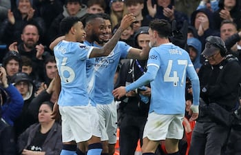 Manchester City's Ghanaian midfielder #42 Antoine Semenyo (2L) celebrates scoring the opening goal with Manchester City's Brazilian midfielder #26 Savinho (L), Manchester City's Egyptian striker #07 Omar Marmoush (C) and Manchester City's English midfielder #47 Phil Foden during the English Premier League football match between Manchester City and Crystal Palace at the Etihad Stadium in Manchester, north west England, on May 13, 2026. (Photo by Darren Staples / AFP) / RESTRICTED TO EDITORIAL USE. No use with unauthorized audio, video, data, fixture lists, club/league logos or 'live' services. Online in-match use limited to 120 images. An additional 40 images may be used in extra time. No video emulation. Social media in-match use limited to 120 images. An additional 40 images may be used in extra time. No use in betting publications, games or single club/league/player publications. /