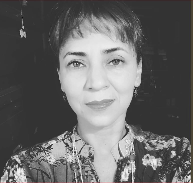 Seminario sobre Cine de Barrio. Asistentes escuchan atentamente, con gestos de interés y tranquilidad.