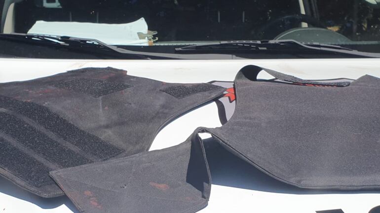 La bala traspasó el chaleco antibalas del guardia y quedó alojada en el corazón.