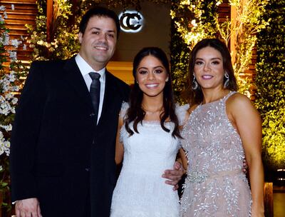 La joven Giuliana con sus padres: Alberto Marín y Adriana Maricevich.