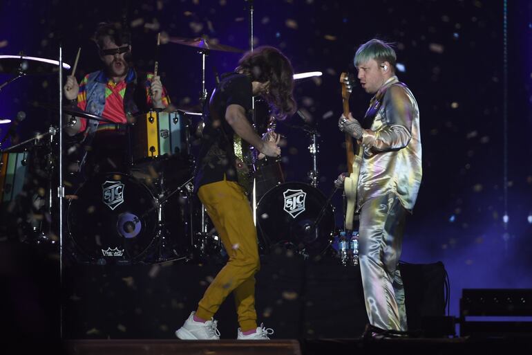 Dan Platzman, Daniel Wayne Sermon y Ben McKee, de Imagine Dragons.