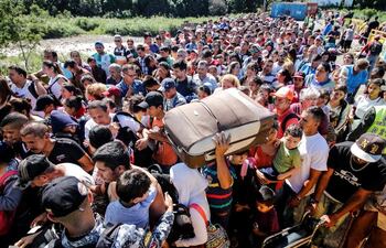 imagen-de-venezolanos-cruzando-un-punto-fronterizo-con-colombia-mas-de-4-millones-de-personas-han-huido-de-venezuela--194426000000-1842802.jpg