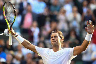 Spain's Rafael Nadal celebrates beating Japan's Yuichi Sugita during their men's singles first round match on the second day of the 2019 Wimbledon Championships at The All England Lawn Tennis Club in Wimbledon, southwest London, on July 2, 2019. (Photo by Daniel LEAL-OLIVAS / AFP) / RESTRICTED TO EDITORIAL USE