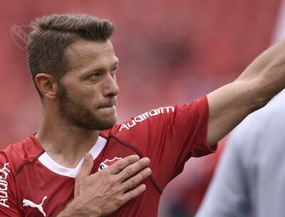 Nicolás Domingo con la camiseta del Rojo.
