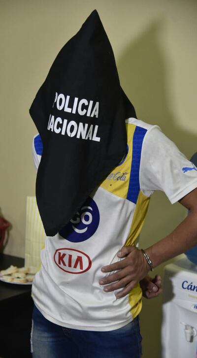 Sospechoso detenido por homicidio y asalto a mano armada.