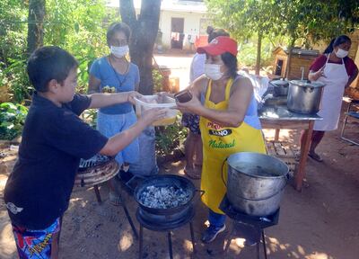 En el asentamiento Nuevo Horizonte se alimentan gracias a las donaciones que reciben.