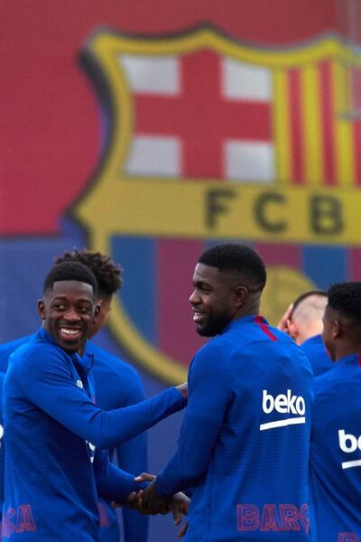 Los franceses Dembélé (i) y Umtiti durante un entrenamiento.