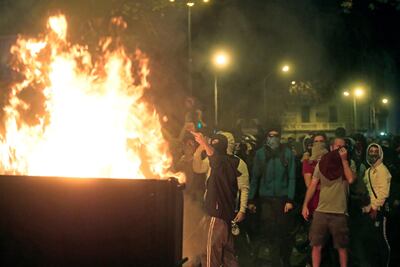 Manifestantes en las inmediaciones de la plaza de Cataluña en una nueva protesta convocada por los autodenominados Comités de Defensa de la República (CDR), después de cuatro noches violentas en las calles de Barcelona.