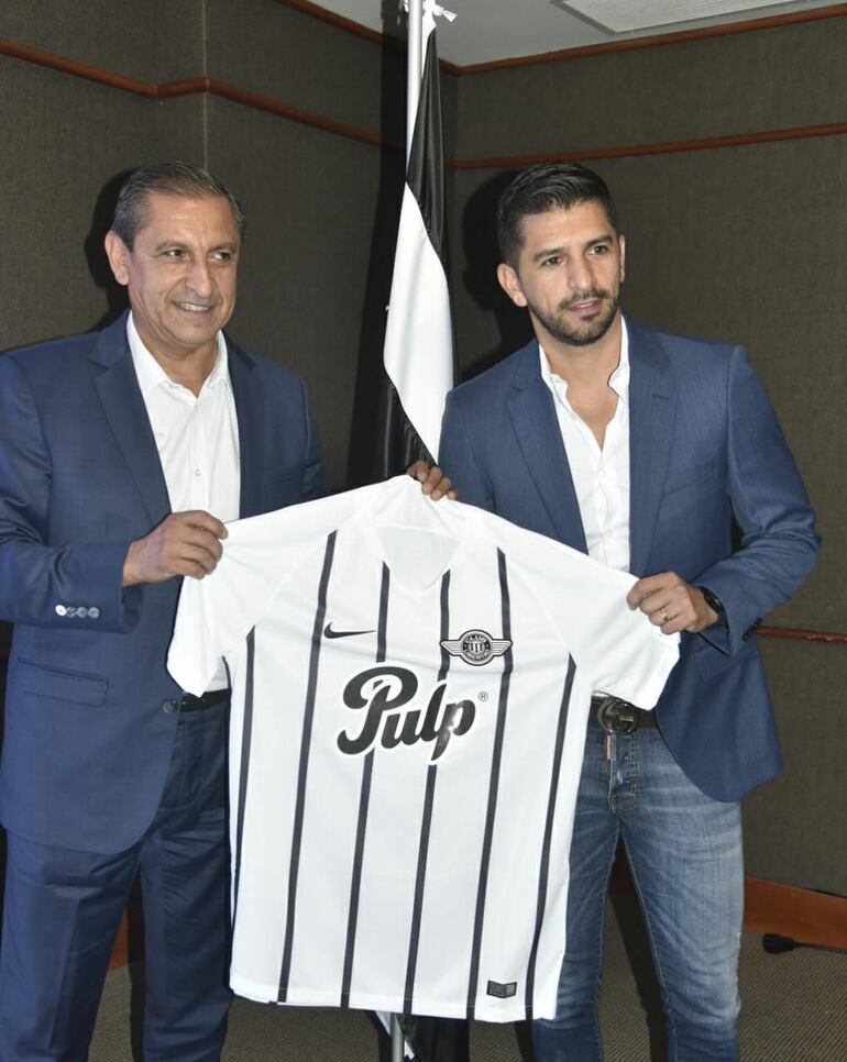 Ramón Díaz junto a su hijo Emiliano.