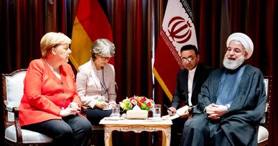 La canciller de Alemania, Angela Merkel, junto con el presidente iraní, Hasan Rohaní, durante una reunión en la ONU.