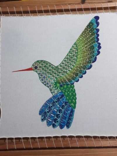 Exposición de ñandutíes en la Manzana de la Rivera