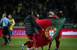 los-jugadores-de-portugal-celebran-despues-de-vencer-a-suecia-193021000000-629108.JPG