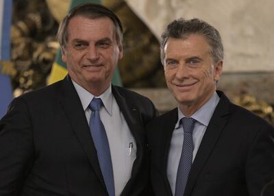 El gobernante de Brasil Jair Bolsonaro, cuyo país preside el liderazgo rotativo del bloque sudamericano, y el presidente de Argentina, Mauricio Macri.