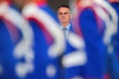 El presidente de Brasil, Jair Bolsonaro, asiste a una ceremonia del cambio de Guardia Presidencial en el Palacio de Planalto en Brasilia.