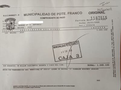 El comprobante de pago expedido al infractor.