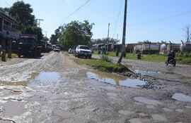 las-calles-de-zeballos-cue-estan-llenas-de-baches-debido-al-transito-de-containers-por-la-zona-y-la-desidia-comunal--200620000000-1106470.jpg