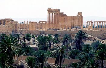 vista-parcial-del-las-ruinas-de-la-ciudad-de-palmira-una-joya-de-la-humanidad-que-reune-testimonio-de-la-arquitectura-grecorromana-con-influencia-lo-222540000000-1368159.jpg