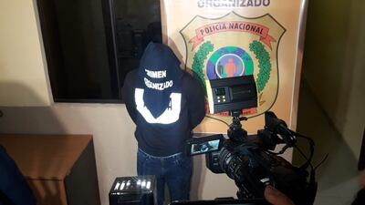 Uno de los detenidos, en la sede de Crimen Organizado de la Policía Nacional, este viernes.