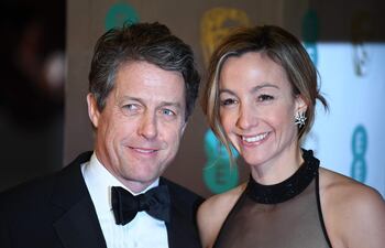 british-actor-hugh-grant-l-and-swedish-producer-anna-eberstein-r-100803000000-1713933.JPG