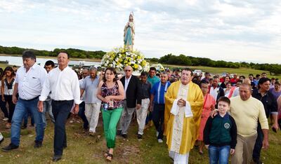 Los fieles acompañaron la procesión náutica y por las diferentes calles de la comunidad.