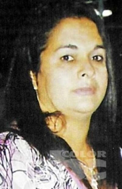 Lizsa Zoraida Alegre (45), buscada por hurto y robo de identidad.