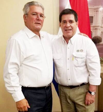 Juan Correa, presidente de seccional que recibió fondos de Itaipú, junto con Horacio Cartes, en Mburuvicha Róga.