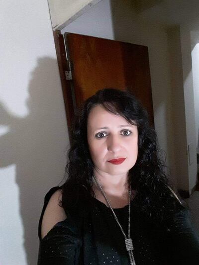 María Teresa Aguiar, la docente de 46 años hallada muerta en su departamento, en Luque.