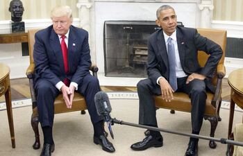 el-presidente-de-estados-unidos-donald-trump-izq-ha-acusado-a-su-predecesor-barack-obama-der-de-ordenar-que-sus-telefonos-sean-intervenidos-203247000000-1560061.jpg