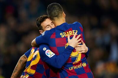 Messi celebra con Suárez tras marcar el quinto gol ante el Mallorca.