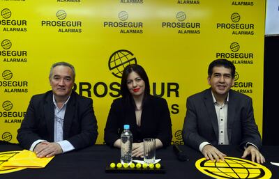 Luis Arce, director de Prosegur Alarmas, Leticia Woroniecki, responsable del canal corporativo de Red Infonet de Bancard, y Andrés Wilfrido Rojas, gerente de gestión al cliente de Prosegur Alarmas.