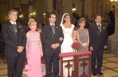 Los contrayentes en compañía de sus padrinos.