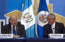 el-secretario-de-la-oea-jose-miguel-insulza-y-el-presidente-de-guatemala-otto-perez-en-la-asamblea-del-organismo--202526000000-562307.jpg