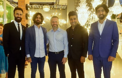 Fadi El Khechen, Hadi El Khechen, Carlos Cálcena, Chadi El Khechen y Ayman El Khechen, en la inauguración de la primera tienda MDL, en Asunción.