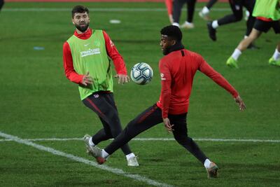Felipe Augusto y Thomas Lemar (d) durante un entrenamiento del equipo en la Ciudad Deportiva Wanda de Majadahonda.