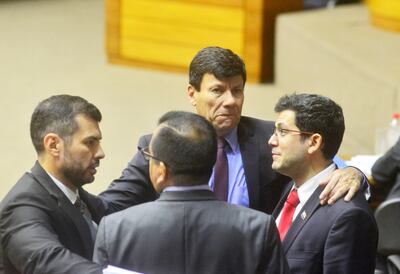 Los colorados Hugo Ramírez (i), Tadeo Rojas (de espalda), Walter Harms y Raúl Latorre.