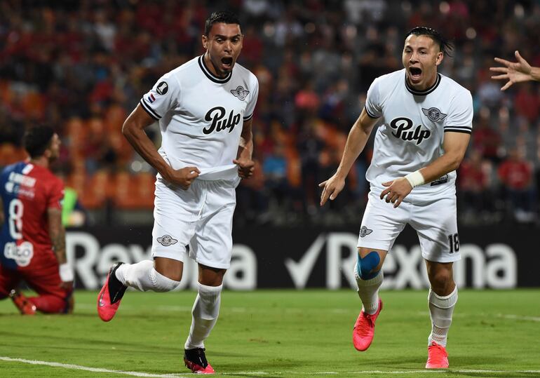 Paraguay's Libertad defender Daniel Bocanegra celebrates his goal against Colombia's Independiente de Medellin during their Copa Libertadores football match at the Atanasio Girardot stadium, in Medellin, Colombia on March 3, 2020. (Photo by JOAQUIN SARMIENTO / AFP)