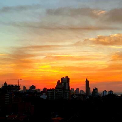 atardecer edificios Asunción cielo nubes temperatura clima pronóstico sol