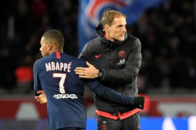 Thomas Tuchel felicitando a Kylian Mbappe.