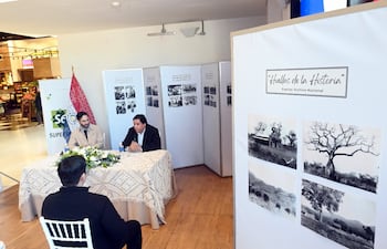 Mario Goia, director de Relaciones Institucionales de Retail SA, y Vicente Arrúa, director del Archivo Nacional.
