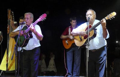 Juan López (derecha) junto a su compañero musical Tito Méndez.