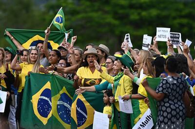 Simpatizantes del presidente de Brasil, Jair Bolsonaro, se manifiestan frente al Palacio de la Alvorada, en Brasilia (Brasil). Lula jurará como nuevo presidente de Brasil el próximo domingo, 1 de enero de 2023.