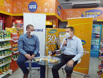 Aníbal Corina, gerente general de Bancard, y Christian Cieplik, directivo de Stock.