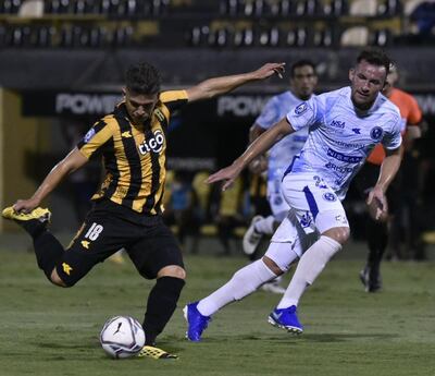 Jorge Valdez Chamorro (i), con la camiseta de Guaraní.