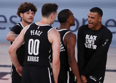 Los Nets festejan su victoria sorpresa sobre los Bucks.