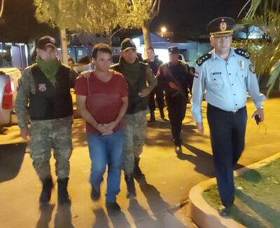 Joel Cardozo López, es conducido por la Policía hasta el calabozo tras descubrirse que tenía orden de captura