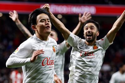 El centrocampista japonés del Mallorca Take Kubo celebra su gol ante el Atlético de Madrid, durante el partido de Liga que el Atlético de Madrid y el Mallorca disputan en el estadio Wanda Metropolitano de Madrid.